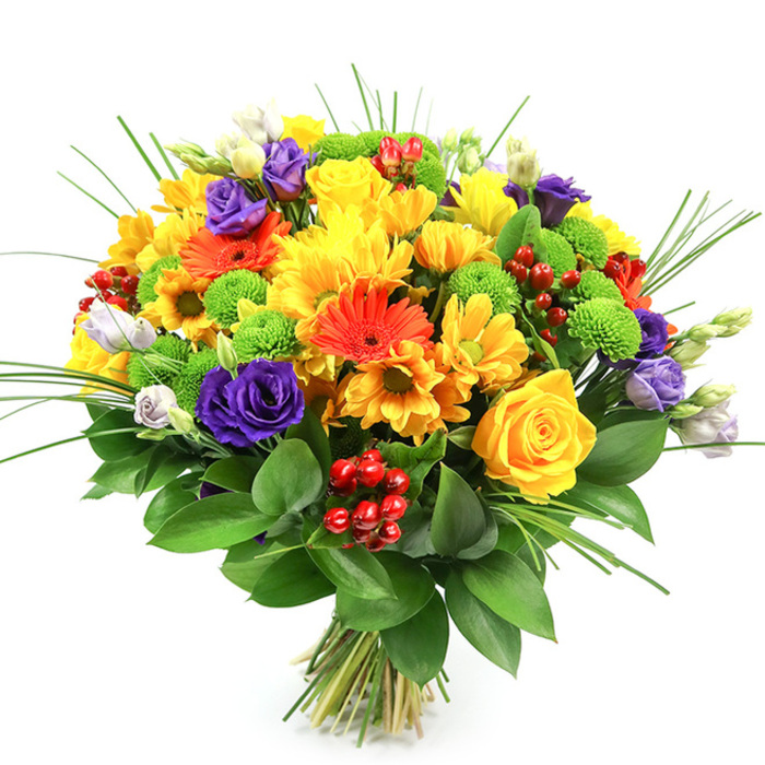 A richly coloured bouquet of mixed fresh flowers is displayed against a clean white background, allowing every shade and shape to stand out as clearly as if viewed in the soft daylight of an Oxford shop window. The arrangement is round and full, with blossoms clustered closely together to create a sense of generous abundance. Yellow blooms form the heart of the design: classic yellow roses with tight, spiralled centres sit beside full-headed yellow chrysanthemums and smaller daisy-like flowers, all radiating a warm, sunlit glow. Around them, strong accents of orange come from lively gerbera daisies and petite orange daisies, their open, circular faces lending an easy smile to the bouquet, reminiscent of late-summer colour along the towpath by the Thames. Deep purple lisianthus blooms, their petals layered like delicate silk, introduce cool contrast and a refined, almost romantic undercurrent, softened further by a few paler lavender and white buds that promise to open in the days ahead. Dotted between the larger blooms, lime-green button chrysanthemums form tidy, spherical cushions of texture, giving the eye places to rest. Small clusters of shiny, ruby-red hypericum berries are nestled in the greenery, catching the light and adding a subtle, berry-bright sparkle that feels especially fitting for celebrations and congratulations sent across areas like Marston or Botley. Long, slender blades of ornamental grass sweep outward in gentle arcs, suggesting movement and airiness above the dense core of flowers. The bouquet is cradled in a collar of broad, dark green foliage that conceals the neatly tied stems, anchoring the design. Overall, it conveys joy, gratitude, and everyday celebration, ideal for marking achievements or brightening a home near one of Oxford's many colleges.
