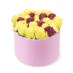 This box arrangement is a study in contrast and harmony in the heart of Oxford, crafted by Flowers Oxford. A round pale pink box sits against a clean white backdrop, its soft matte surface inviting touch. The dense bloom cluster within is dominated by cheerful soft yellow blooms, their petals opening to reveal sunny centers and a light, zesty fragrance that lifts the mood much like a crisp spring morning along the Oxford Canal. Lacing the yellow field are smaller, deep purple or burgundy roses, placed with precision to create depth, elegance, and a regal undertone. The petals spiral into tidy rosettes, their curves catching the light and casting gentle shadows that enhance the bouquet's plush volume. The box itself appears almost suede-like to the touch, a soft texture that reinforces the gift's premium feel. The arrangement is tightly packed, yielding a lush, almost decadent silhouette that nudges the lip of the box as if inviting the recipient to lean in. This piece speaks of thoughtful artistry and intention, ideal for milestone events in Oxford such as graduations at the university or anniversaries along High Street, or simply to lift a friend's spirits. Available for same day delivery across Oxford, this bouquet blends energy with refinement and offers a bright, heartfelt message from the florist who knows the city well.
