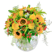 Capturing the golden brightness of an Oxfordshire afternoon, this bouquet seems to embody the cheerful soul of the city-radiating warmth, vitality, and thoughtful artistry. At the vibrant core, bold sunflowers lift their dark, velvety centers like eyes turned to the sun, fringed by gleaming petals that evoke the radiant fields at the edge of town. Interwoven with them, plush yellow roses spiral open, each bloom a little celebration in itself, promising happiness and connection. Parades of lively orange blossoms and glossy red berry clusters add splashes of playful colour, dancing among the crisp greenery and airy, soft ferns that edge the design with gentle motion-like the river breeze in South Park. All are carefully arranged in a rounded, clear glass vase, where tangle and symmetry blend artfully and the stems float beautifully together, visible through pure, fresh water. The bouquet's lightly sweet and green fragrance lifts the senses, echoing Oxford's gardens in full bloom. Designed for same-day delivery by a local Oxford florist, this arrangement brings instant light and positive energy to birthdays, thank-yous, or any day that could be brightened by a touch of local floral beauty.