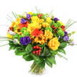 A joyful, hand-tied bouquet of mixed seasonal flowers is photographed against a pristine white background, its colours and textures standing out as vividly as if placed on a bright windowsill overlooking Oxford's rooftops. The composition is rounded and lush, with very little empty space between blooms, giving a feeling of generous, carefully considered abundance. Yellow flowers take centre stage: traditional yellow roses with elegantly wound petals are surrounded by soft, cushiony yellow chrysanthemums and smaller daisy-like blooms, creating an immediate impression of warmth and optimism. Interspersed are strong hits of orange from large gerbera daisies and their smaller daisy cousins, their open faces and sturdy petals offering a playful, contemporary twist that suits happy birthdays and thank-you deliveries throughout central Oxford. Deep purple lisianthus flowers, shaped like miniature roses, add a cooler note and visual depth, their velvety petals curling softly outwards. Lively lime-green button chrysanthemums bring a crisp, modern texture; their neat, spherical heads dot the design like little garden ornaments. Clusters of glossy, ruby-red hypericum berries nestle between the petals, providing a polished, bead-like detail that feels both festive and refined. Slender arcs of ornamental grass rise and sweep over the bouquet, giving a sense of lift and movement above the densely packed centre. The whole arrangement is framed by broad, dark green leaves, which form a supportive base and hide the precisely tied stems, suggesting a bouquet ready for hand delivery. The overall mood is upbeat and celebratory, perfect for brightening a study in Jericho, welcoming someone home near Iffley Road, or marking a special moment with colour and life.