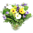 In the bright, airy studio of a skilled Oxford florist, this lush bouquet is elegantly arranged in a clear glass vase, the glass revealing the neatly grouped green stems submerged in cool water. The white backdrop makes every blossom pop with cheerful clarity. The arrangement glows with a sunny spectrum: bold yellow Gerbera daisies punctuate the design, their large heads framed by dark centers that feel like little suns. Interlaced among them are clusters of Lisianthus in soft lavender and deeper purple, some fully opened, others still in elegant bud, giving the arrangement depth and movement. Pristine white Calla lilies provide sleek, architectural counterpoints with their smooth, trumpet-shaped petals. Interspersed among them are white Alstroemeria with tips of yellow and green. The greens do the lifting - silvery eucalyptus branches add a whisper of fragrance and a cool sheen, while broader leaves create a lush grounding backdrop, making the colours appear even brighter. A subtle black ribbon around the stems inside the vase anchors the bouquet with quiet precision. The overall mood is bright, uplifting, and contemporary, suitable for birthdays, celebrations, or a warm welcome home in an Oxford living room. In daily life here, you would be happy to know this blooms-to-door freshness can be delivered across the City of Oxford, from Summertown to Jericho, adding a touch of sunshine to any doorstep.