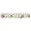 A bespoke GRANDPA floral tribute stretches horizontally across a pure white backdrop, each bold letter lovingly shaped from a mass of small white chrysanthemums that give a downy, cushioned effect. The petals overlap closely, forming a continuous blanket of white that feels peaceful and steady, ideal for a funeral or memorial service. Around every letter runs a fine edging of soft lilac and richer purple blossoms, likely statice or heather, which defines the shapes and adds a cool, serene contrast to the bright white centres. In several places, the calm surface is gently broken by accent sprays: on the G and the first A, clusters of lily-like white blooms mingle with vivid pink and fuchsia flowers and deeper purple notes; the second A and the D carry similar combinations, with the occasional bright green button chrysanthemum and foliage leaf adding a fresh, spring-like touch. All seven letters are mounted on a slim, dark green frame that runs quietly behind them, ensuring the word reads clearly from a distance, whether the tribute is placed in a church near Oxford's High Street or laid beside a grave in a quieter parish cemetery. The lighting is even and soft, emphasising the clean lines, the crisp white petals, and the gentle band of purple around each letter. Overall, the arrangement conveys a sense of loving remembrance and family unity, a personal farewell created to say a dignified, heartfelt goodbye to a much-loved grandad whose life may have been closely connected to the streets, parks, and riverside walks of Oxford.