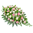 This image shows an elegant, elongated funeral spray, carefully arranged in a flowing teardrop form and photographed against a bright white background so every colour and texture is clear. The floral design is dominated by numerous pink roses in varying stages of bloom, their petals soft and velvety, unfurling in layers from pale blush to richer rose pink. These roses are interwoven with clusters of pure white carnations or spray carnations, whose finely ruffled petals add both volume and a gentle, cloud-like softness. The contrast between the warm pink and clean white creates a soothing, balanced palette, ideal for conveying quiet condolences. Around and beneath the flowers, lush greenery is arranged with a practiced florist's hand: broad, glossy dark green leaves form a strong framework, while rounded, silvery eucalyptus leaves add cooler tones and a suggestion of subtle fragrance. In several places, especially toward the narrower end of the spray, delicate strands of trailing dark green ruscus extend beyond the main body of the arrangement, introducing a natural, cascading rhythm. The spray is fuller and rounded at one end, then gracefully narrows to a fine point, a traditional shape often chosen to rest atop a casket or beside a memorial book during a service. The overall impression is one of serene beauty and heartfelt respect, a floral tribute that could easily be imagined placed in a quiet Oxford chapel, a crematorium on the city's outskirts, or a village church in the surrounding countryside, offering comfort and a gentle reminder of enduring love.
