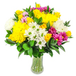 A lush, dome-shaped bouquet overflows from a clear glass vase, positioned against a pure white background that highlights its vivid, summery palette. At its core, bright yellow roses and large yellow chrysanthemums radiate warmth, their densely layered petals creating a sense of fullness and energy, much like sunlight spilling across the cobbled streets of central Oxford. These golden tones are softened by clusters of fluffy white chrysanthemums and petite white daisy-like flowers whose lime-green centres bring a crisp, contemporary edge. Threaded throughout are striking magenta and fuchsia chrysanthemums, their bold shades adding lively contrast, while more delicate pastel pink blossoms are tucked between the larger heads, lending a whisper of romance and depth. A generous collar of deep green foliage frames the flowers, the glossy, oval leaves wrapping around the base and weaving through the centre, giving the bouquet structure without sacrificing its relaxed, abundant feel. The vase itself is simple and elegant, with a gentle curve that lets you see the neat bundle of green stems resting in clear water, suggesting just-cut freshness and careful conditioning. The overall impression is one of joy, celebration, and easy charm-perfect for an affordable birthday surprise in Botley, a pick-me-up delivered to an office near the High Street, or a bright just because gesture to someone in Marston. As a local Oxford florist, this is the kind of cheerful mixed bouquet we love to create: rich in texture, generous in colour, and designed to make an ordinary day feel that little bit more special.