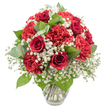 A lush, dome-shaped bouquet of red and white flowers stands in a clear glass vase, beautifully lit against a crisp white background that allows every nuance of colour and texture to stand out. The focal point is a gathering of rich, velvety red roses, their petals tightly curled into romantic spirals that seem to promise unfolding affection and devotion. Around and between them, abundant red carnations add volume and softness; their frilled, almost feathery petals catch the light in different ways, giving the arrangement a sense of depth and gentle movement. Weaving through the red blooms is a generous layer of pure white baby's breath, creating a misty, cloud-like effect that softens the palette and brings a fresh, airy brightness to the design. Sprays of greenery, including dark green rose foliage and rounded eucalyptus leaves with their soft, silvery tone, peek out here and there, framing the flowers and adding a naturally elegant contrast. The clear vase, with a simple, slightly flared opening, reveals the neatly gathered stems and clear water, underscoring the bouquet's freshness and expert preparation. The overall mood is romantic yet reassuringly classic, like a timeless gift shared after a walk along the River Thames in Oxford or a graduation celebration near the dreaming spires. Perfect for anniversaries, Valentine's Day, or heartfelt thank-yous, this red and white arrangement is the kind of bouquet you might choose to send across Oxford when you want your feelings to be seen and felt without saying a word.