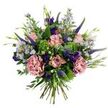 This hand-tied bouquet reads like a breezy Oxford meadow caught at the soft hour before noon: pale, antique-pink roses sit at the centre, some cupped and others unfurling to show slightly darker pink petal edges, while two full, dusty-rose carnations with ruffled, mauve-pink layers add depth and a tactile, velvet-like presence. Slender spikes of deep indigo-violet veronica rise through the composition, their vertical lines giving the arrangement a lively, upward rhythm. Scattered among them are small, aster-like lavendar-blue flowers with sunny yellow centres that impart a delicate, wildflower air; these lighten the bouquet and make the composition feel airy and spontaneous. Deeper purple lisianthus buds and blossoms punctuate the pinks and blues, offering jewel-like contrast. The filler is a studied mix of silvery-green, rounded eucalyptus leaves that lend a soft, muted coolness, and bright lime-green, cloud-like clusters of viburnum or Santini-style chrysanthemums that create a fresh, verdant foundation. Slender green leaves and emerging buds thread through the blooms, enhancing an organic, just-gathered-from-the-garden look. The stems are gathered and visible at the base, a deliberate hand-tied finish that suggests barer, honest craftsmanship. Light falls gently from one side, lifting the pastel tones and making the textures-ruffled carnation edges, the veronica's spikes, the eucalyptus's matte sheen-readily apparent. There is a faint sense of scent: cool eucalyptus and soft rose, like a walk through the Botanic Garden at dawn. This bouquet is at once celebratory and quietly tender, well suited to brighten a bedside, mark a thoughtful birthday, or offer serene sympathy while carrying the gentle character of Oxford's gardens and green spaces.