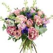 Captured against a pure white background, this hand-tied bouquet forms a generous, rounded dome of colour and texture, as if just arranged on a workbench in a small Oxford florist near the covered market. At the centre, roses in shades of soft pink, muted dusty rose, and delicate peach open in layered spirals, while nearby buds remain partially closed, giving a sense of evolving beauty over several days. Surrounding them, opulent carnations with distinctly ruffled petals create depth and volume, their magenta-edged frills fading into creamy blush centres in a graceful two-tone effect. Among these romantic hues, deep indigo and violet-blue anemones emerge, each with a dark, nearly black eye that introduces a refined contrast, much like the interplay of stone and shadow along Broad Street at twilight. Pale pink and lavender stock flowers rise gently above and between the larger blooms, their densely clustered florets lending a soft, feathery texture and suggesting a light, comforting fragrance. Encircling the flowers, silvery-green eucalyptus leaves with their rounded shapes mix with darker, broader foliage, framing the arrangement in fresh, natural greenery that recalls a peaceful walk through Christ Church Meadow. The stems of the bouquet are clearly visible at the base, neatly gathered in a classic hand-tied style that reveals fresh, green cut ends and a few woody textures, ready to be placed straight into water. Bright, even lighting reveals every velvety petal, subtle colour transition, and leaf vein, creating an impression of elegant calm, perfect for sending as a birthday surprise, a romantic gesture, or a thoughtful same-day delivery anywhere in Oxford.