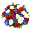 A lush, patriotic bouquet of roses fills the frame, composed in a tight, rounded dome of deep red, snow white, and vibrant cobalt blue blooms, all shown against a pristine white backdrop that highlights every nuance of colour. The roses are expertly massed together so that their heads form a continuous cushion of petals, with no gaps, just a seamless tapestry of tones. Each red rose is a rich, velvety crimson, its petals spiralling open with classic elegance. The white roses are cool and luminous, their gently ruffled edges catching the light in delicate highlights. Between them, the blue roses add a bold, almost regal accent, creating a tricolour arrangement that feels especially suited to patriotic observances or civic ceremonies in Oxford's historic heart. Dark green foliage is threaded discreetly between the blooms, just enough to deepen the overall palette and provide a natural counterpoint to the strong primary colours. The lighting is even and bright, similar to a clear day over the spires of Oxford, picking up the fine textures of every petal and giving the impression that the bouquet has just been prepared for delivery. The composition is formally balanced, with each colour distributed evenly so that the eye moves smoothly across the arrangement, never settling in one place for long. This bouquet would feel at home at national celebrations, remembrance gatherings, or as a bold centrepiece in homes from Summertown to East Oxford, expressing unity, courage, and heartfelt respect through its striking rose trio.