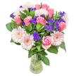 There is an unmistakable poetry flowing through this bouquet, much like the gentle breeze winding its way along the towpaths by Port Meadow. Soft pink roses-each petal unfurling with a whispered promise-pair seamlessly with pale gerberas, glowing delicately against the backdrop of Oxford's lush greenery. The roses catch the morning light, their blush hues warmed as though kissed by the dawn over St Giles. Sprightly bursts of vivid violet statice leap among the blooms, their wild fragrance and papery texture offering cheerful spontaneity, a reminder of the market stalls' colour along Cowley Road. Every detail feels both vibrant and serene, with the bouquet arranged in a way that speaks to both joy and tranquility. Designed for moments of heartfelt celebration-from thoughtful birthday wishes in Headington to gentle congratulations after an exam-the arrangement has a way of making its recipient feel cherished and part of Oxford's storied tapestry. Each flower chosen symbolizes not just beauty, but connection and meaning within this beloved city.