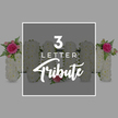 A refined photograph features a bespoke floral letter tribute designed for a funeral or memorial, set against a soft grey background that keeps the mood calm and respectful. At the heart of the image, framed by a slim white rectangle, are three floral letters spelling MOM, each one built entirely from tightly packed white chrysanthemum heads. Their gently ruffled petals form a plush, cushion-like texture, evoking softness and quiet comfort, reminiscent of the stillness by Oxford's canals on an early morning. The first M is dressed at its upper left side with a richly coloured cluster of flowers: a vibrant fuchsia pink rose fully opened, surrounded by lighter pink rosebuds and sprigs of delicate green fern, which arc gracefully over the edge of the letter. The O remains mostly pure white, its round form accented only at the base with a single, medium pink rose, suggesting a simple yet deeply personal token. The second M mirrors the first, with an identical fuchsia rose and fern arrangement placed at the upper right, creating a pleasing visual balance across the three letters. Overlaid within the white frame, white lettering reads 3 LETTER in a crisp sans-serif typeface, with the word Tribute in flowing script beneath, identifying the style of arrangement. Around the central design, the cut-off sides of more white chrysanthemum letters, also sprinkled with pink roses and greenery, can be seen, implying that longer names or words may be crafted in the same style. The overall feeling is one of tender remembrance and thoughtful floral artistry, the kind of personalised arrangement a family in Oxford might choose to honour a much-loved mother during a final farewell.